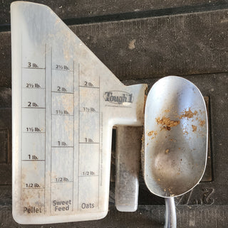 Two different scoops used to feed horses